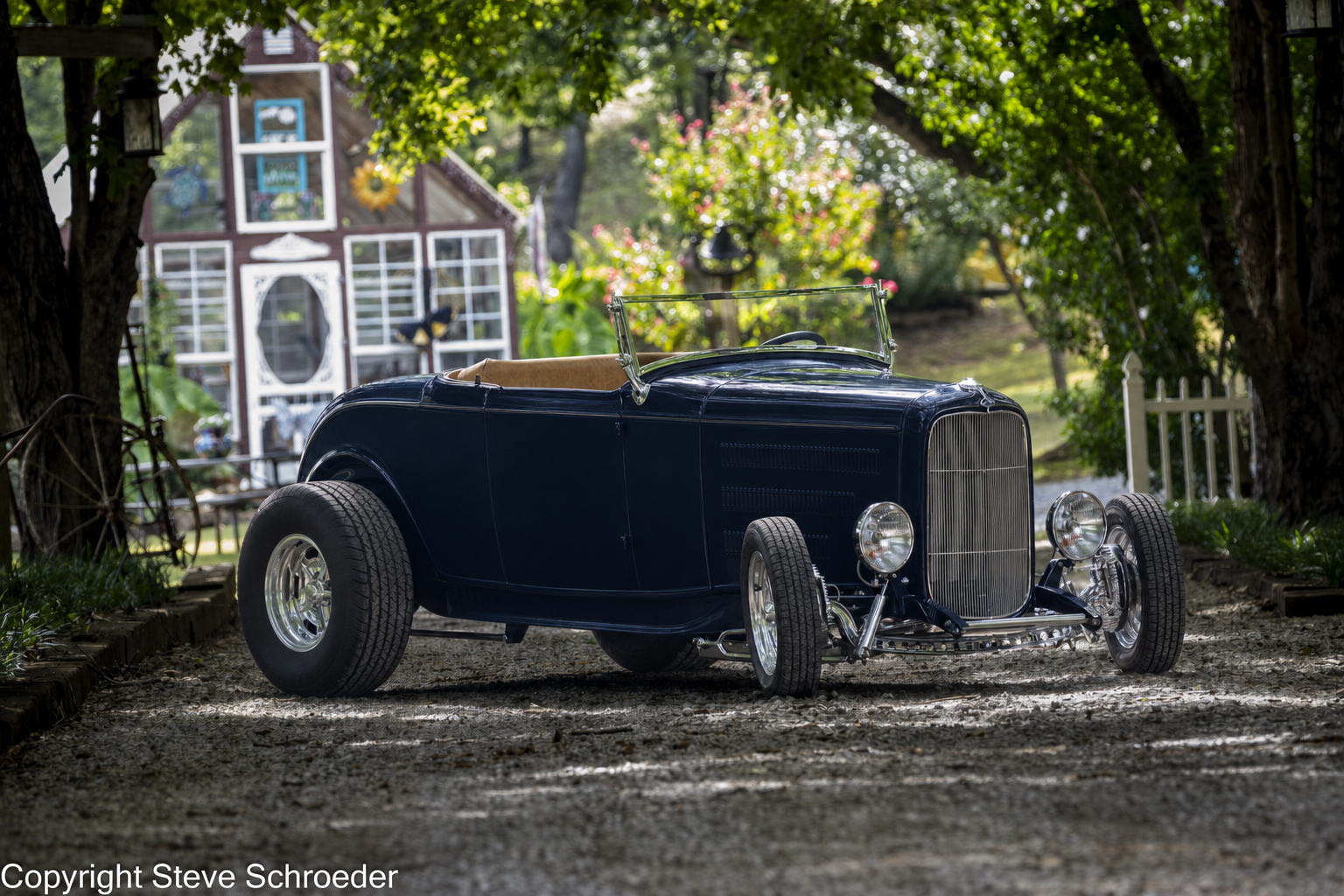 Bob's Nightmist Blue 1932 Ford Roadster photographed beneath a canopy of trees