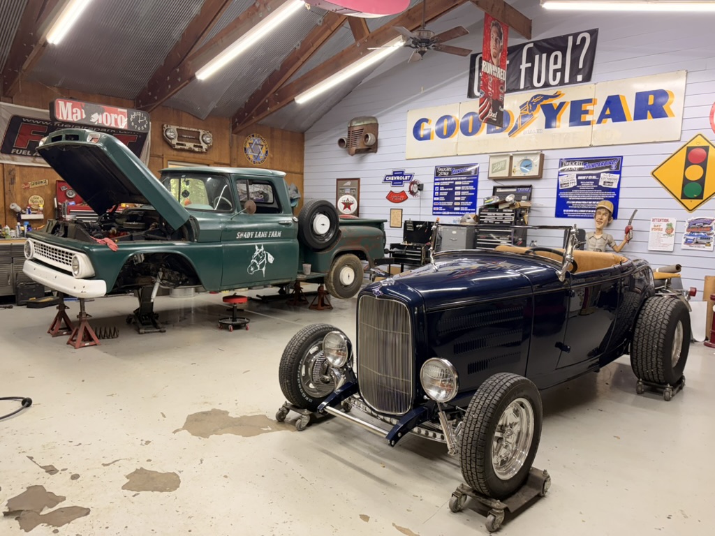 Bob's Nightmist Blue 1932 Ford Roadster displayed in the Hot Rod Alley workshop