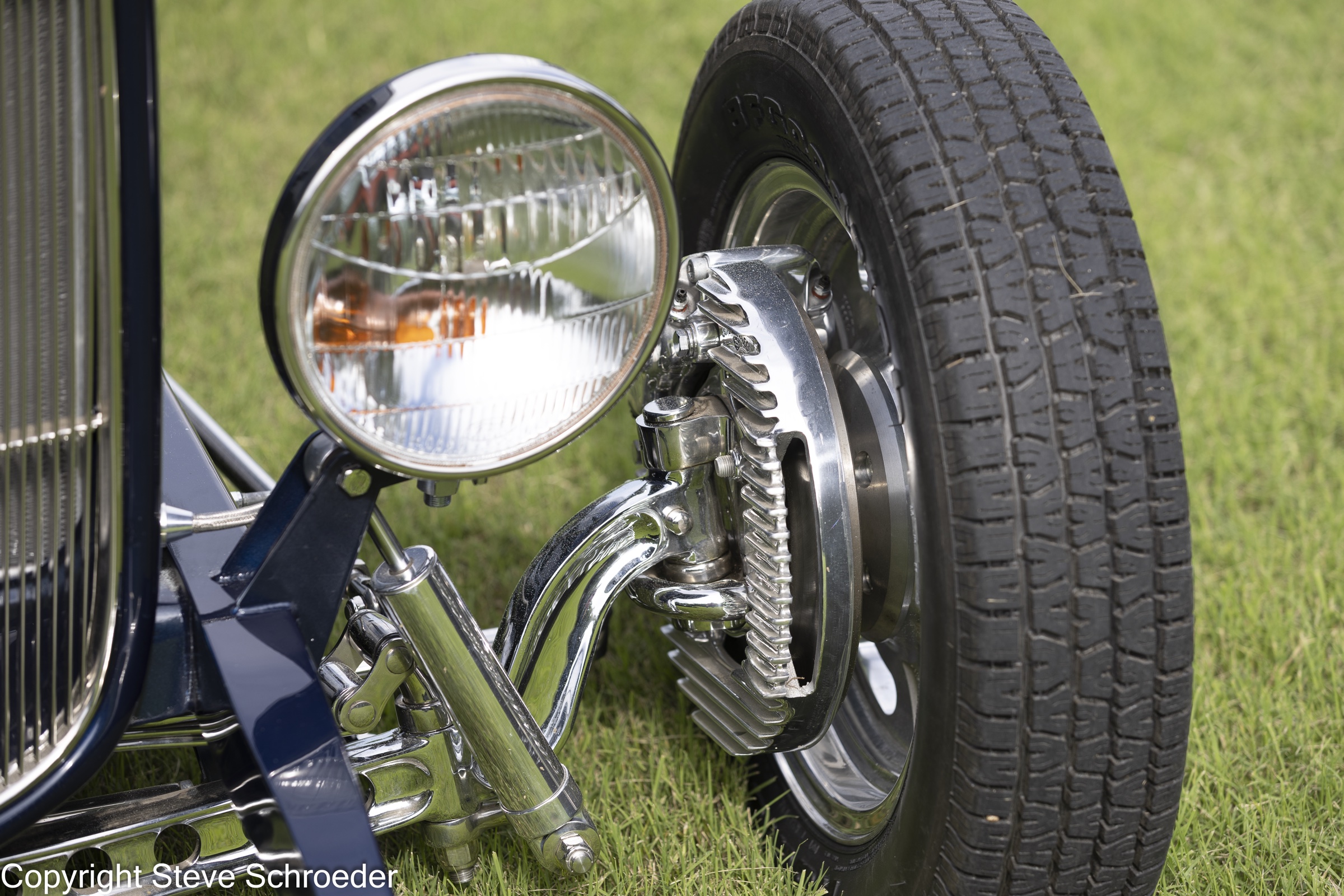 Headlight and polished front suspension detail